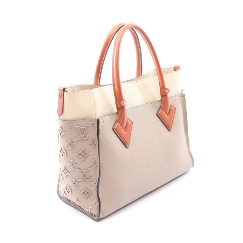 Louis Vuitton Tuftage Beige Canvas Handbag On Monogram Side Leather My